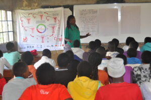 BCW Staff facilitating the topic of the Menstrual Health Cycle in Lelach at an ARP course in October 2024